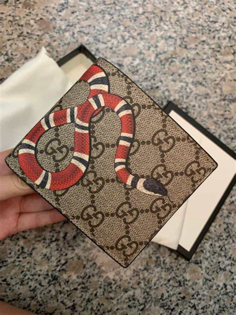 fake mens gucci wallet|authentic gucci snake wallet.